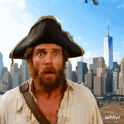 A pirate looking at the camera in shock as the second plane hits the second tower of the world trade center in the background